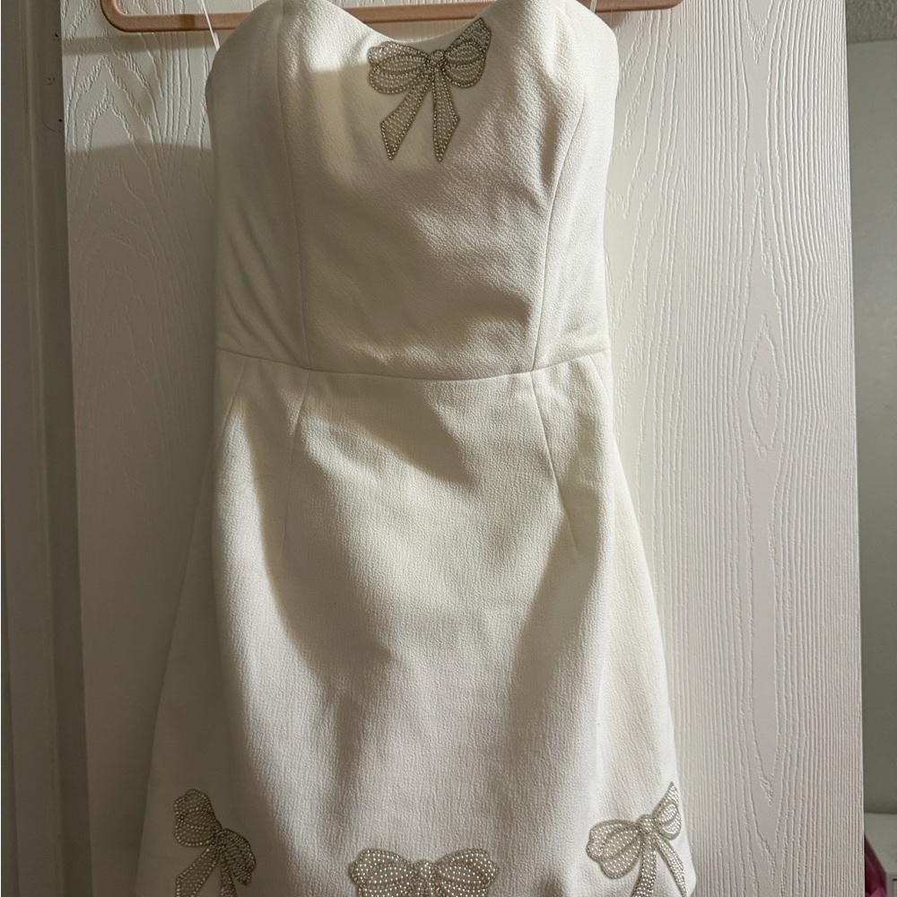 Helsi Elegant White Dress with Bow Accents